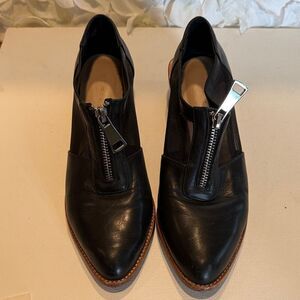 Women's Black Leather Pointed Zip-Front Flats